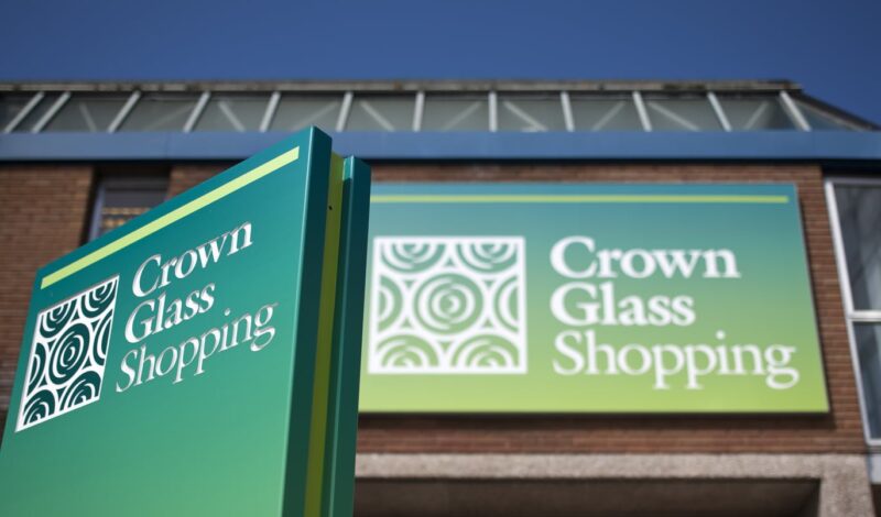 Front entrance signage for crown glass shopping