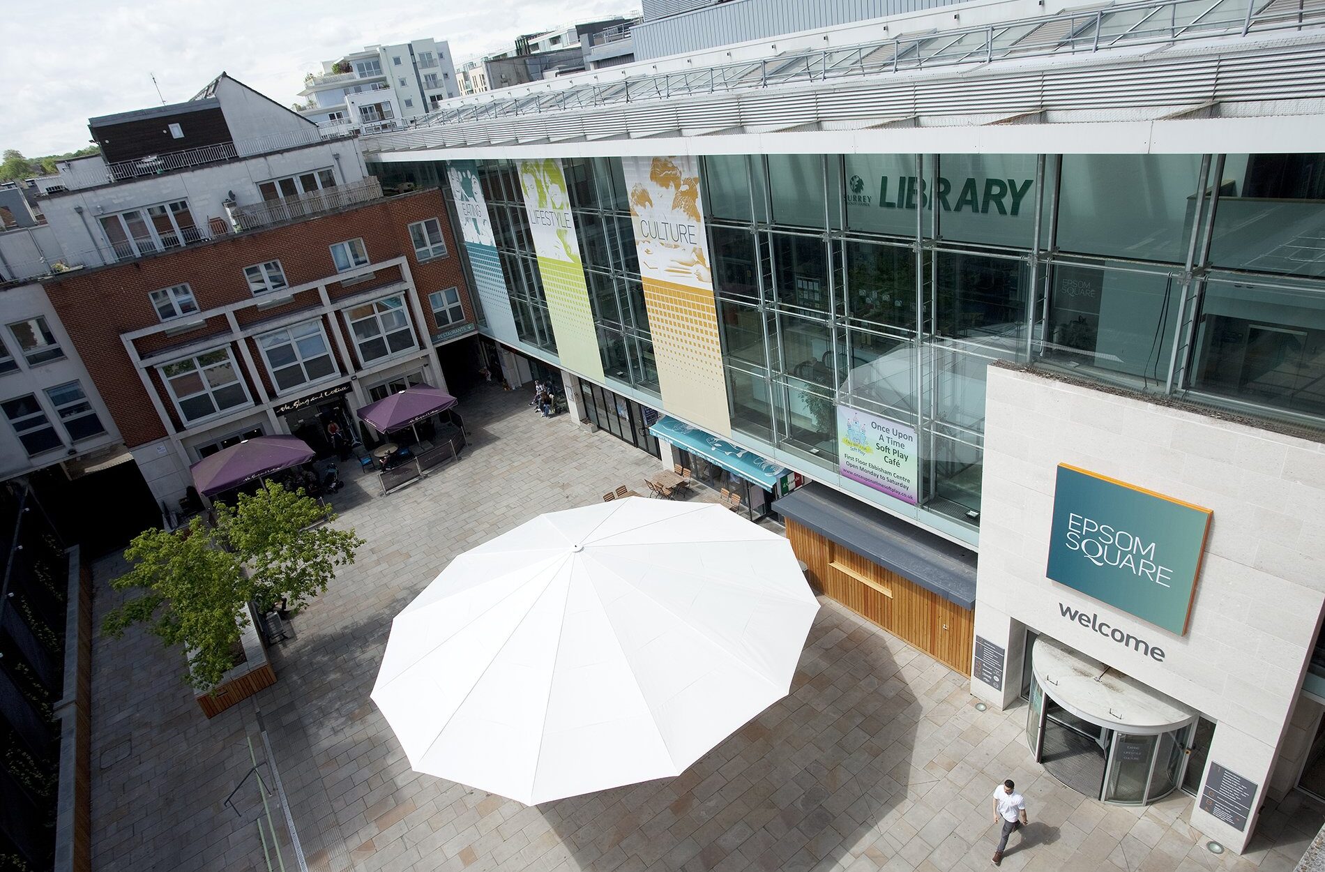 Roof top view of Epsom Square shopping centre courtyard Beyond London Epsom Square Shopping Centre Retail Design Asset Enhancement Brand Identity Signage & Wayfinding Customer Experience design
