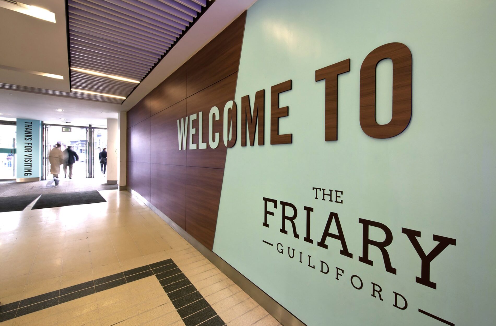 Welcome signage at The Friary shopping centre Beyond London The Friary Shopping Centre Brand Identity and Shopping Centre enhancement Retail Design Interipr Design Signage & Wayfinding Customer Experience design