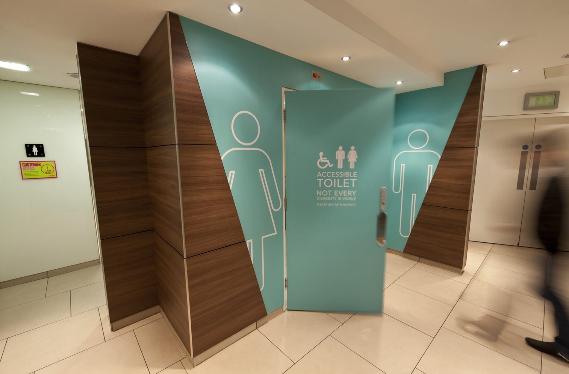 Wall graphics on the toilets at The Friary shopping centre Beyond London The Friary Shopping Centre Brand Identity and Shopping Centre enhancement Retail Design Interipr Design Signage & Wayfinding Customer Experience design