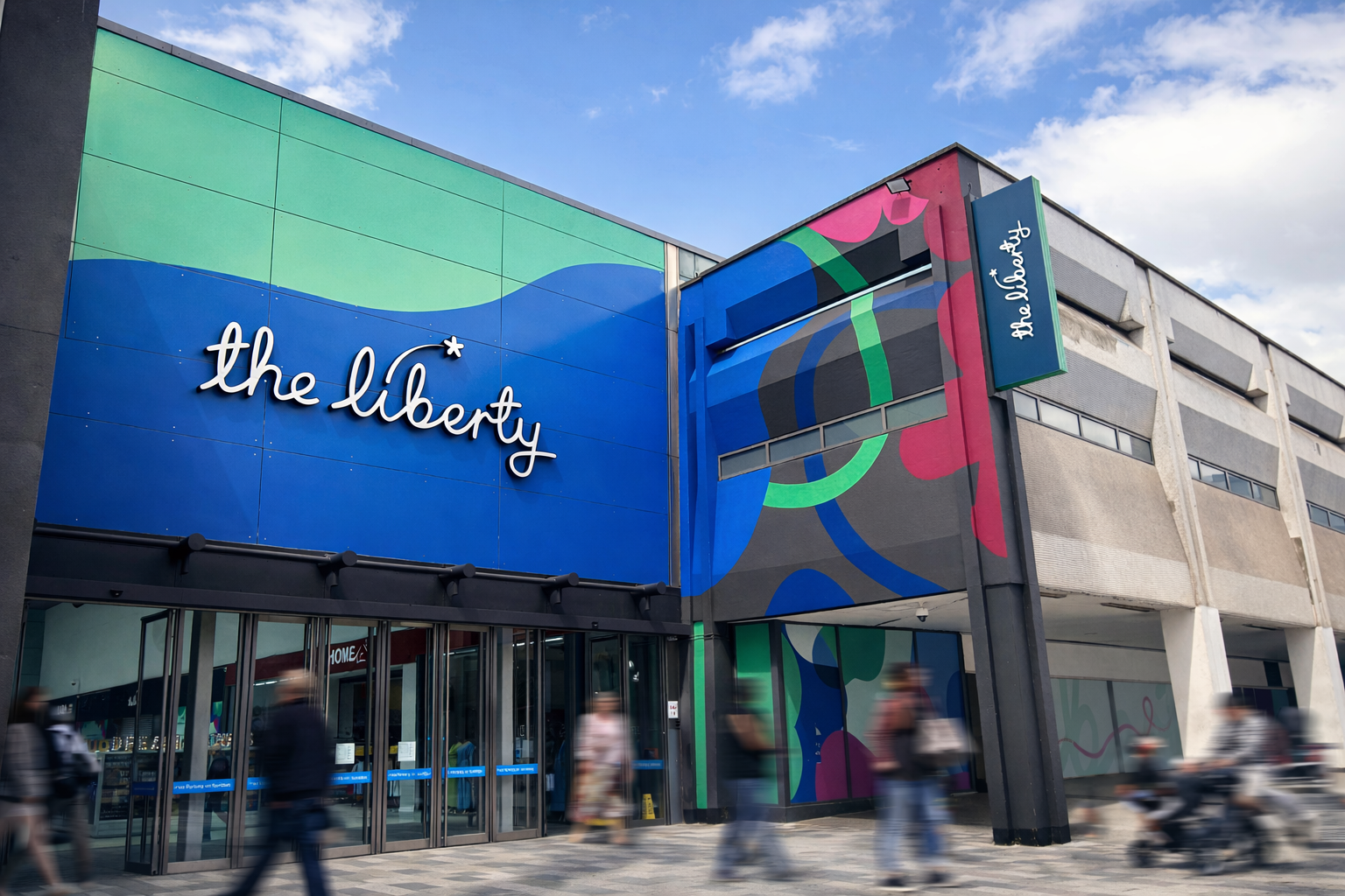 Rebranded main entrance to The Liberty Romford shopping centre with bold graphics and signage enhancing visibility and the arrival experience